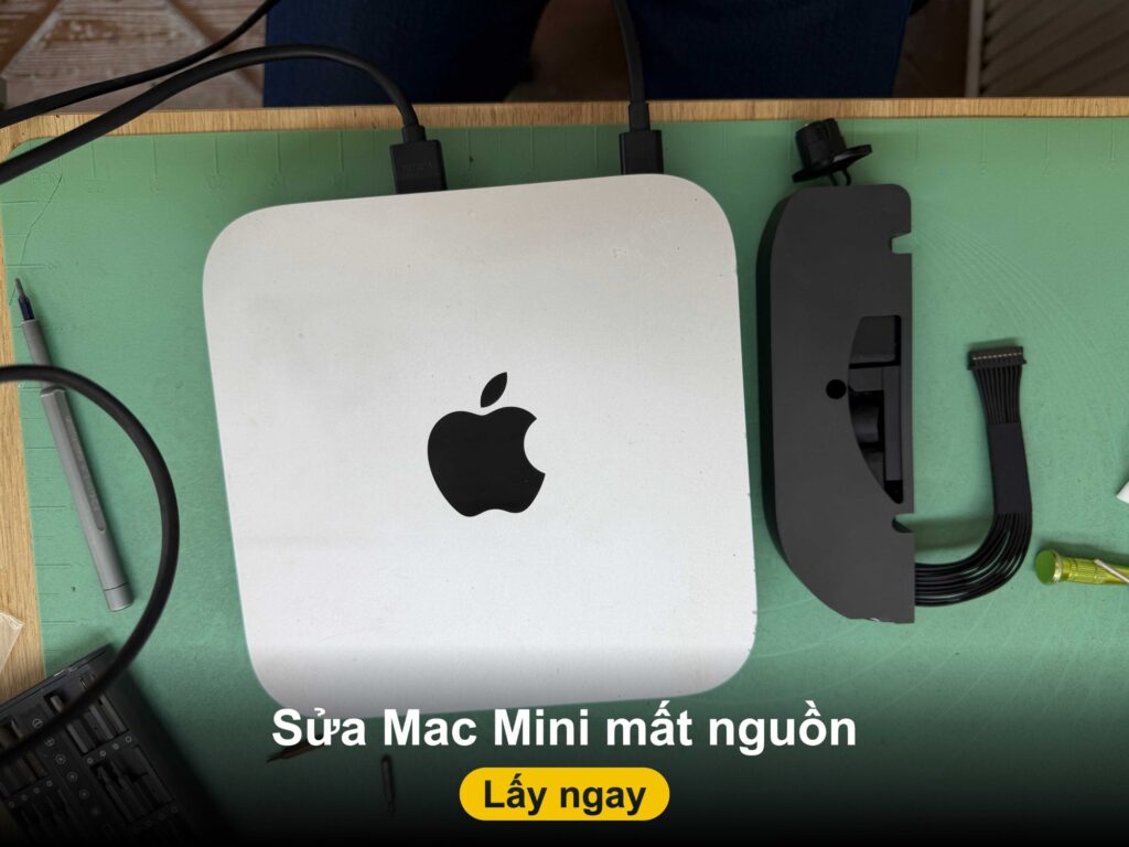 Sửa Mac mini không lên nguồn tại Shop Táo Care Đà Nẵng - Mac mini và bộ nguồn tháo rời trên bàn kỹ thuật